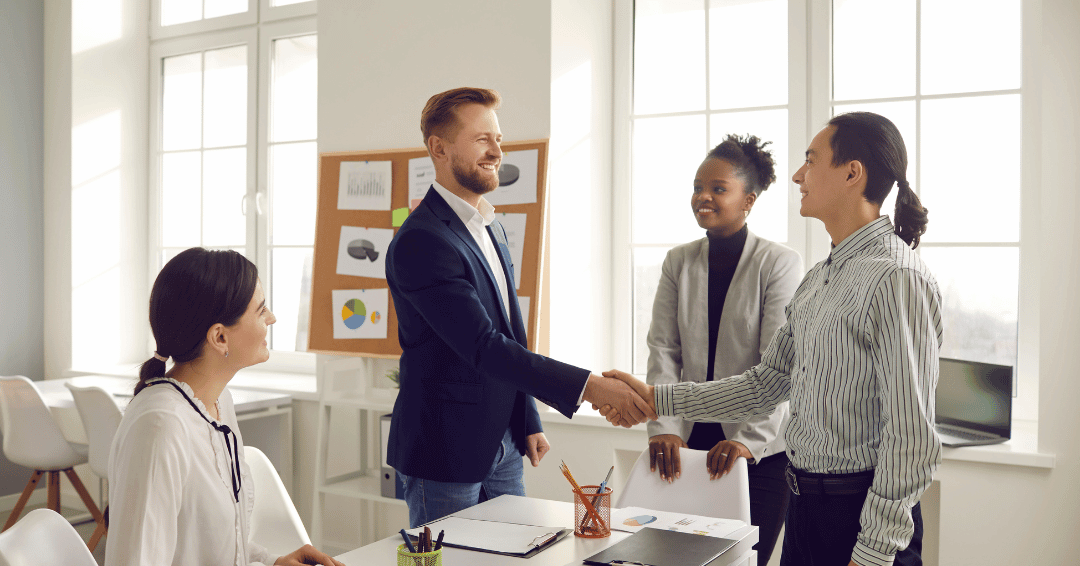 Supplier negotiating contract value in a team meeting.