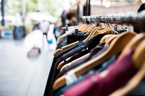 Rack of clothes in a retail store.