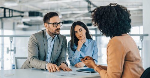 Team working together to understand how to prevent financial leaks.