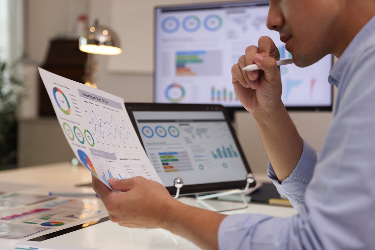 Financial professional reviewing statements and reconciliations 